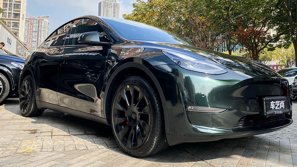 特斯拉Model Y改装,model y改装 特斯拉modely黑色施工ax祖母石绿龙膜畅悦80前档案例